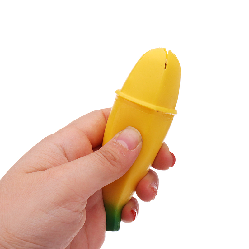 Novelty-Squeeze-Pop-Out-Silicone-Banana-Doll-Stress-Relief-Toy-Keychain-Funny-Gift-1278444