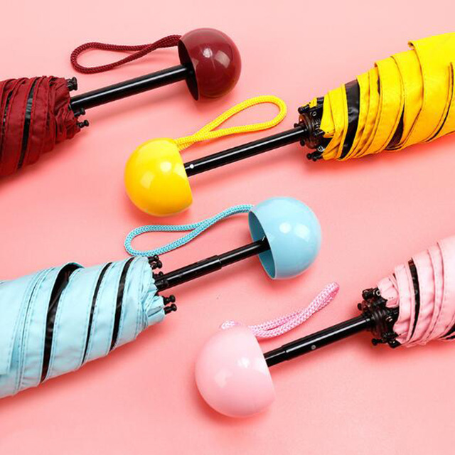 Honana-HN-KU4-Compact-Mini-Pocket-Capsule-Umbrella-Light-Weight-Tiny-Waterproof-UV-Rain-Umbrellas-1271849